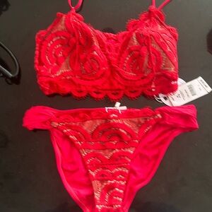 New with tags. PQ Crimson Lace Bikini